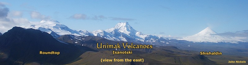 Roundtop, Isanotski & Shishaldin Volcanoes on Unimak Island, viewed from the east.